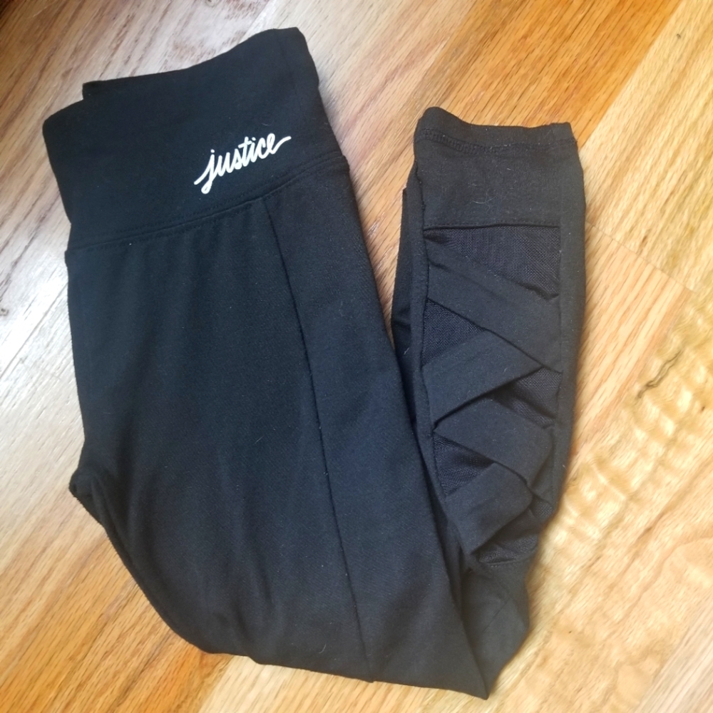 JUSTICE Active Leggings. X patterned lower outside of each calf.